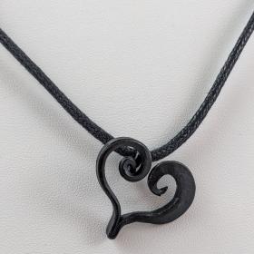 The forged heart necklace features a line in the shape of a heart that curves excessively at the top.