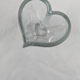 Aerial view of the heart vase, which narrows at the base and appears to be a heart within a heart.